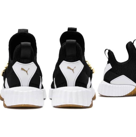 puma defy mid varsity black